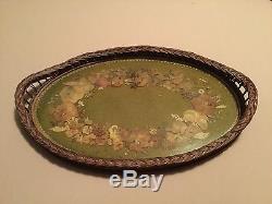 Antique wicker serving tray with pressed flowers under glass