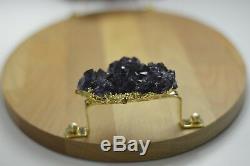 Wooden serving tray for food with natural amethyst stones